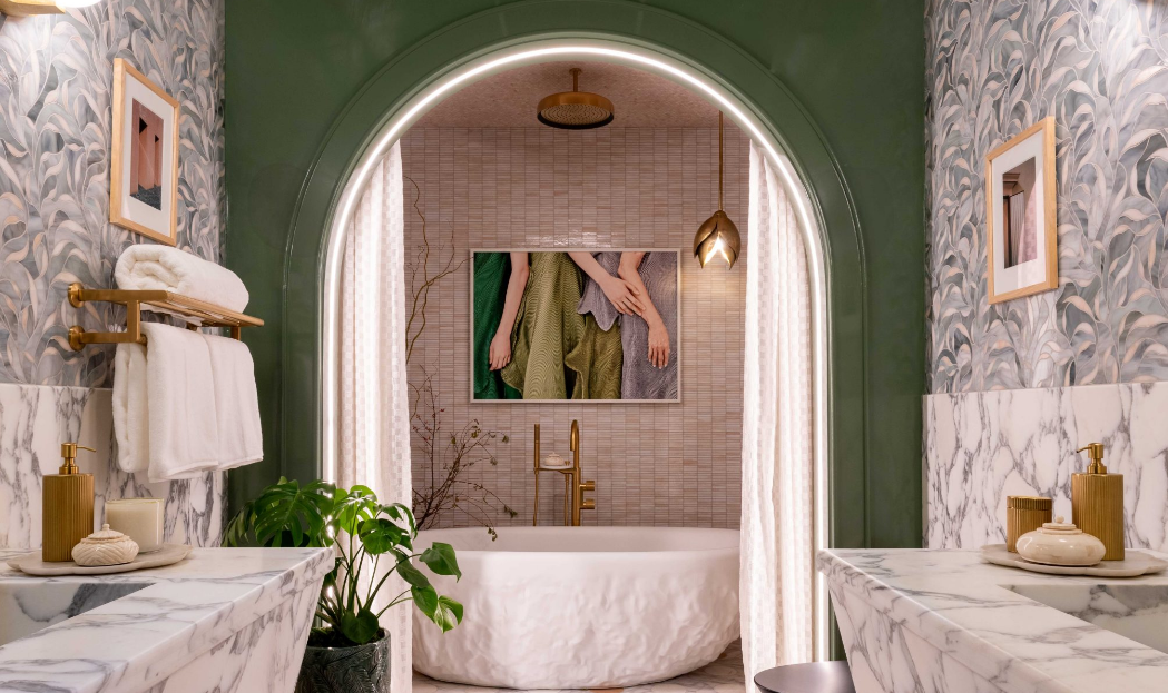 Luxury bathroom interior design with marble counters and a freestanding tub.